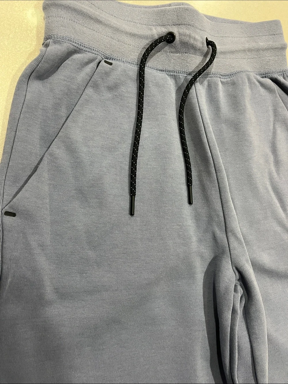 Nike Tech Light Blue Joggers with Black Accents
